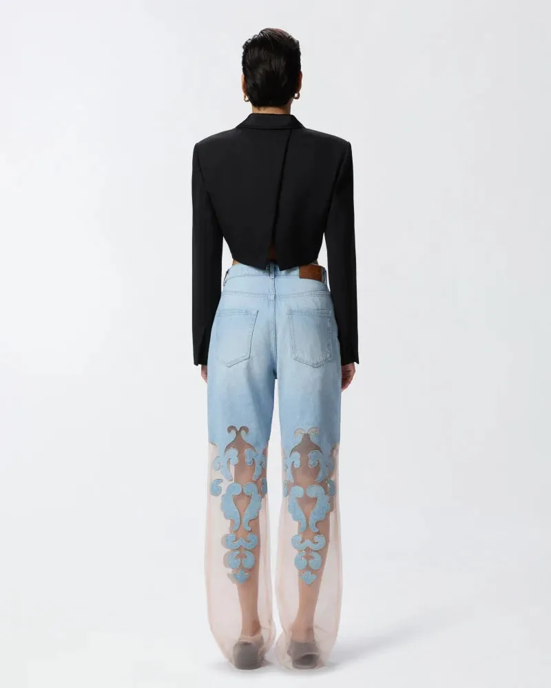 Denim jeans with applique and organza